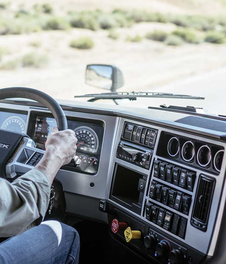 A person driving a car Description automatically generated with medium confidence